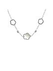 Collier en Acier Inoxydable Argenté avec Motifs Fleur Nacrés – Élégance Naturelle et Moderne