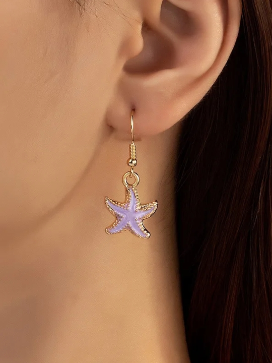 copy ofBoucles d’Oreilles Dorées Coquillage Nacré – Élégance Marine Minimaliste