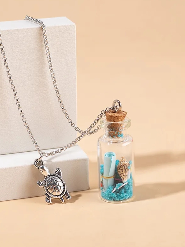 Collier bouteille à message & pendentif tortue argentée