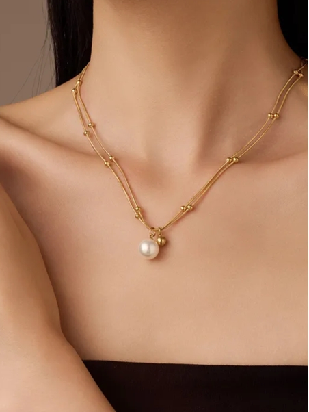 Collier Double Rang Doré & Perle – Élégance Raffinée en Acier Inoxydable