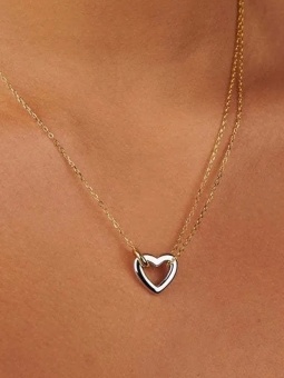 Collier Cœur Ajouré Doré – Élégance Minimaliste en Acier Inoxydable