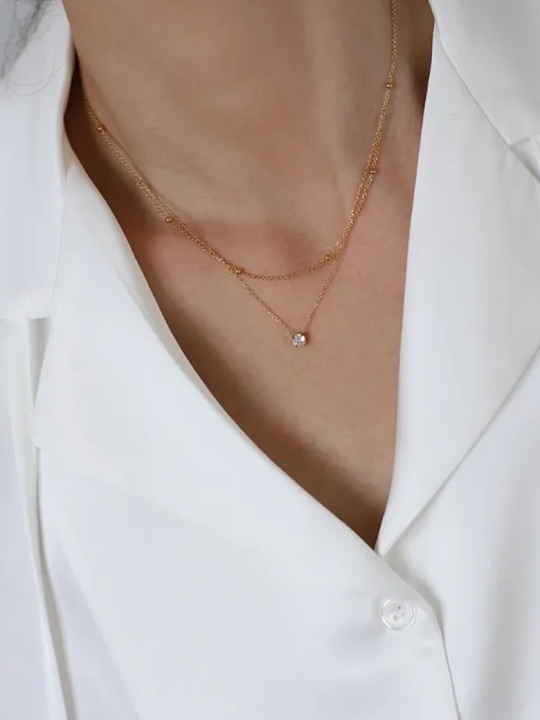 Collier Double Chaîne & Zircon Doré – Élégance Minimaliste en Acier Inoxydable