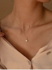 Collier Double Chaîne Étoile & Zircon – Lumière Dorée en Acier Inoxydable