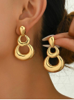 copy ofcopy ofcopy ofBoucles d’Oreilles Martelées Doré en Acier Inoxydable – Design Organique Élégant